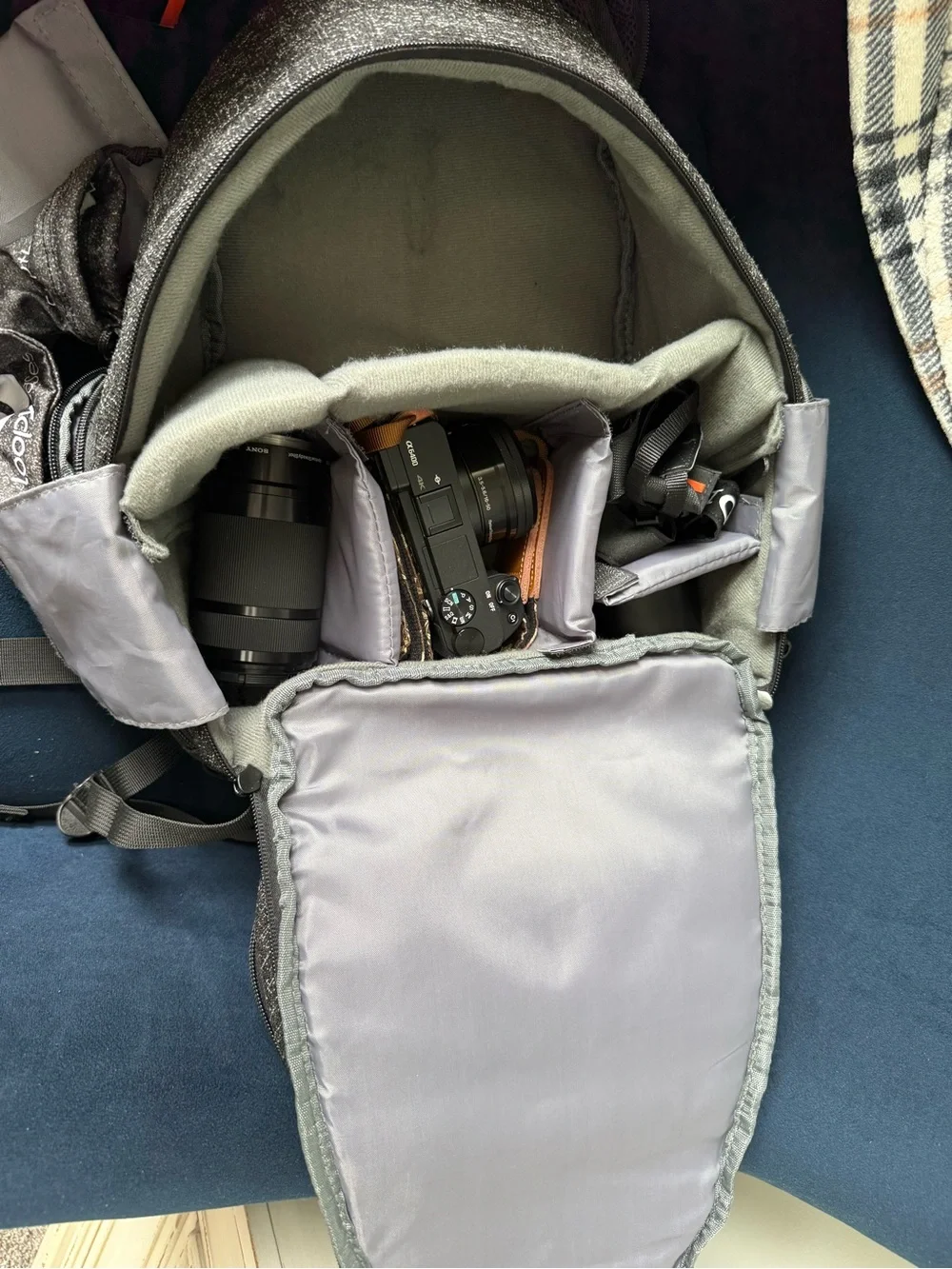 Sony Mirrorless Camera Kit with Gray Backpack and Black Lenses
